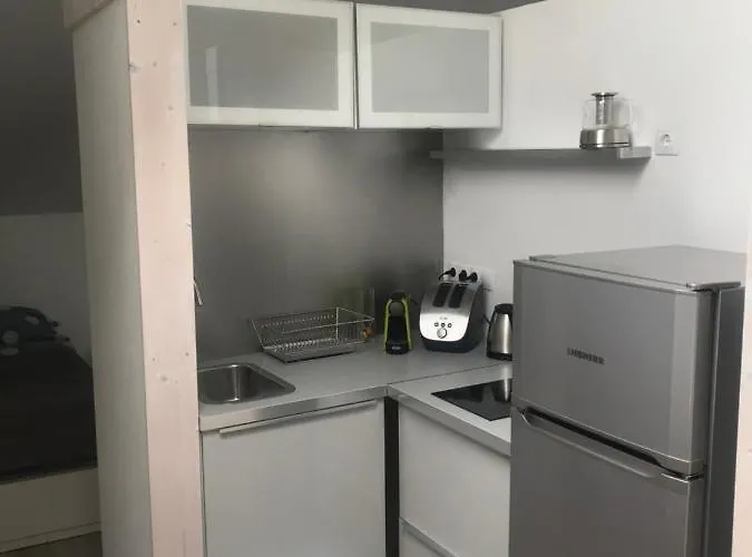 Zimo Taliandoeroegdi Mozihaz דירה